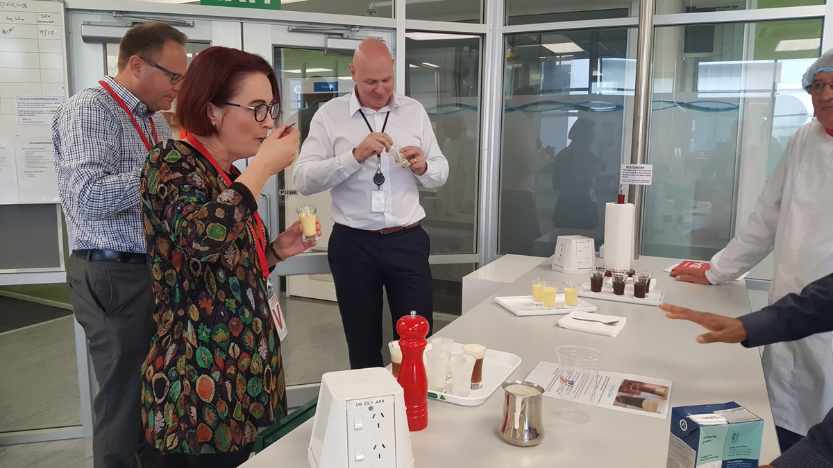 People tasting samples of a food product